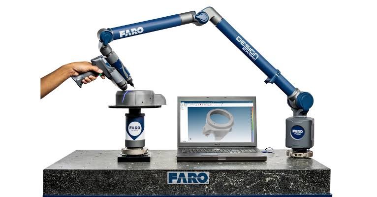 Portable 7-axis articulated arm CMM inspecting a component on site